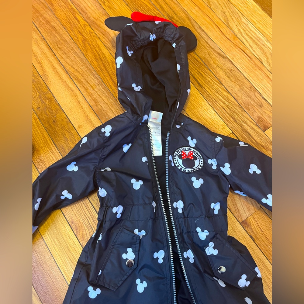 Black, white, and red Minnie Mouse rain coat with red bow on hood — Size 2T